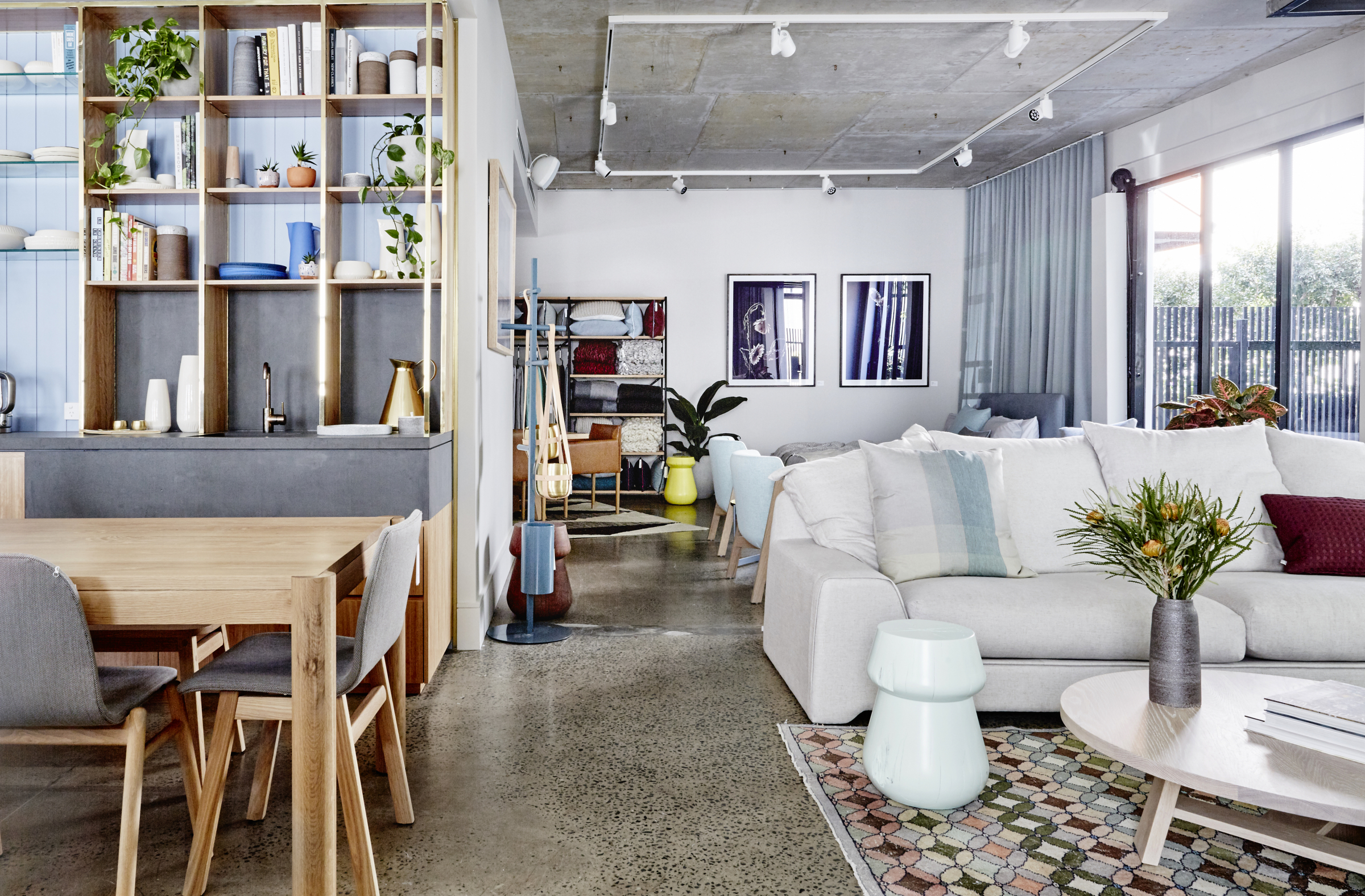 Stylish modern living area with neutral tones and greenery in Jardan Brisbane.