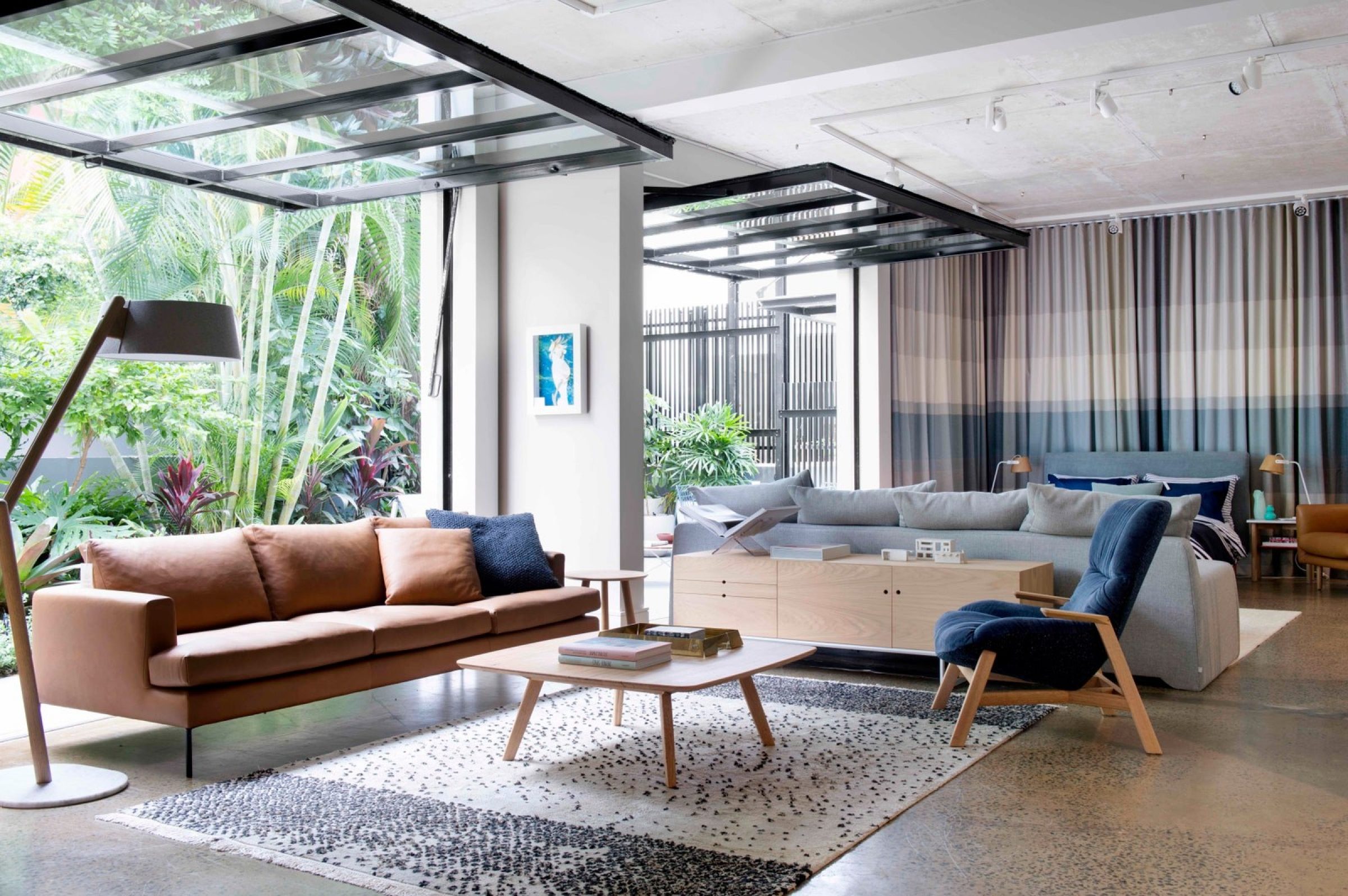 Modern living room interior with stylish furniture and lush greenery in Jardan, Brisbane.