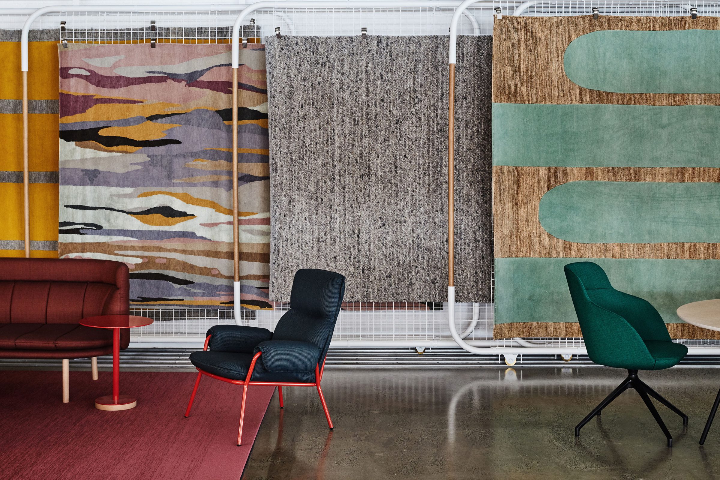 Contemporary furniture and vibrant rugs displayed in Jardan, Melbourne showroom.