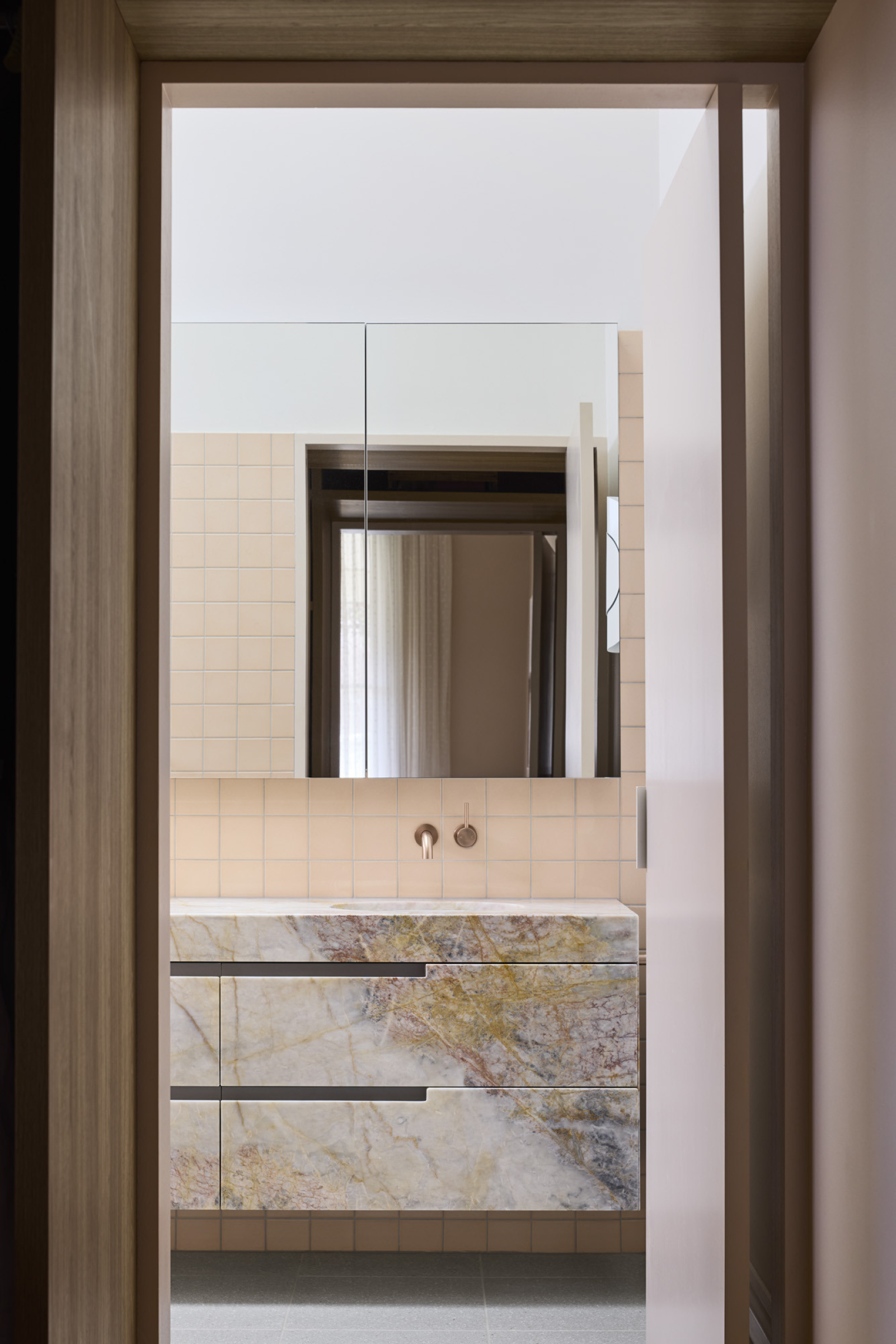 Modern bathroom design with marble cabinet in "Day House".