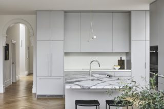 Modern kitchen interior with marble countertops and minimalist design in Day House.