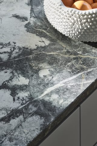 Textured ceramic bowl on a marble countertop from Day House.