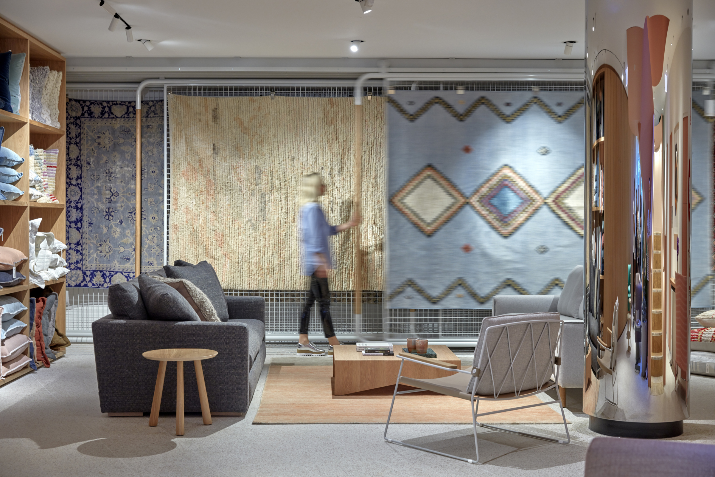 Modern interior design showcase with rugs and furniture at Jardan Sydney showroom.