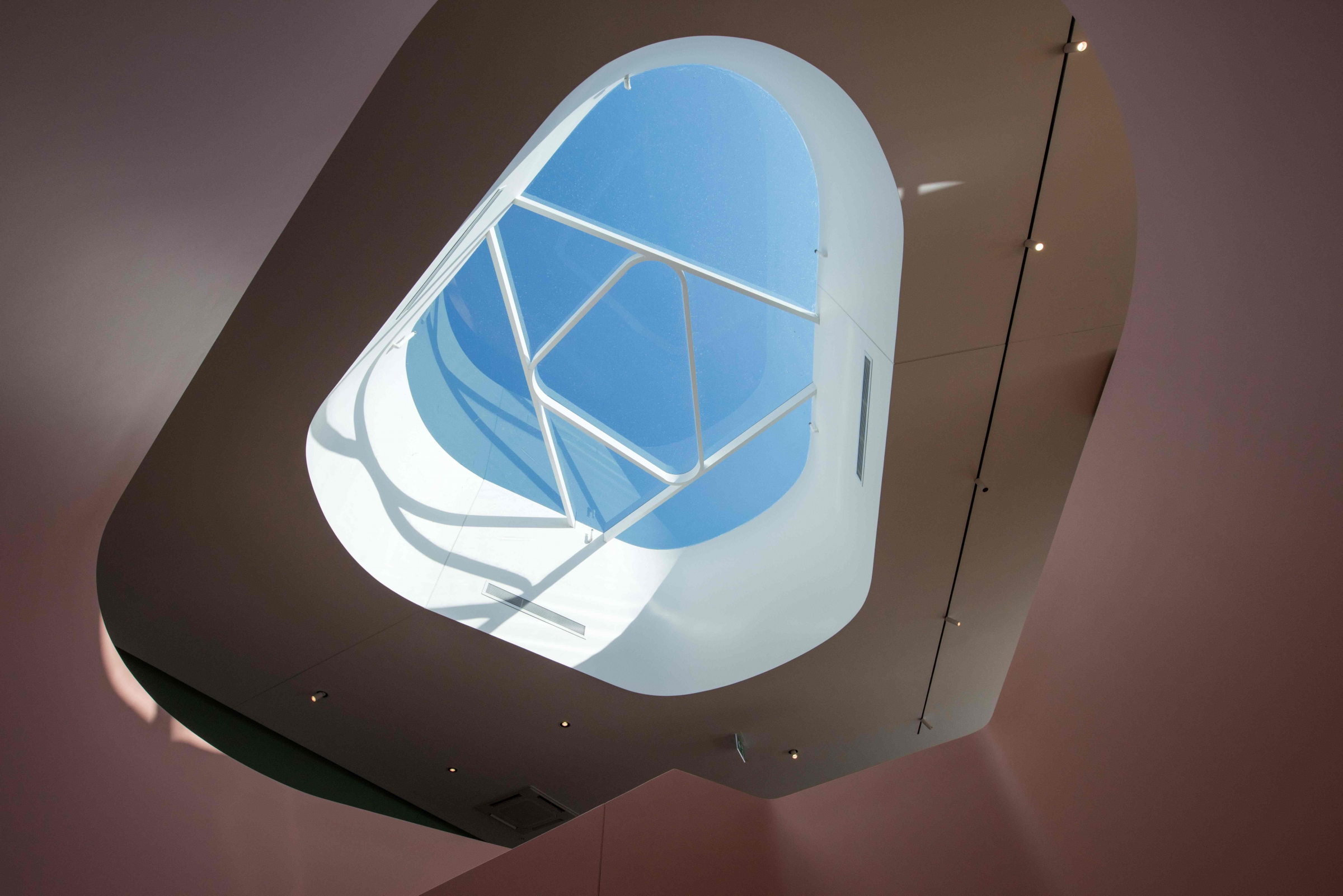 Modern architectural skylight design featured in Jardan Sydney with blue sky view.