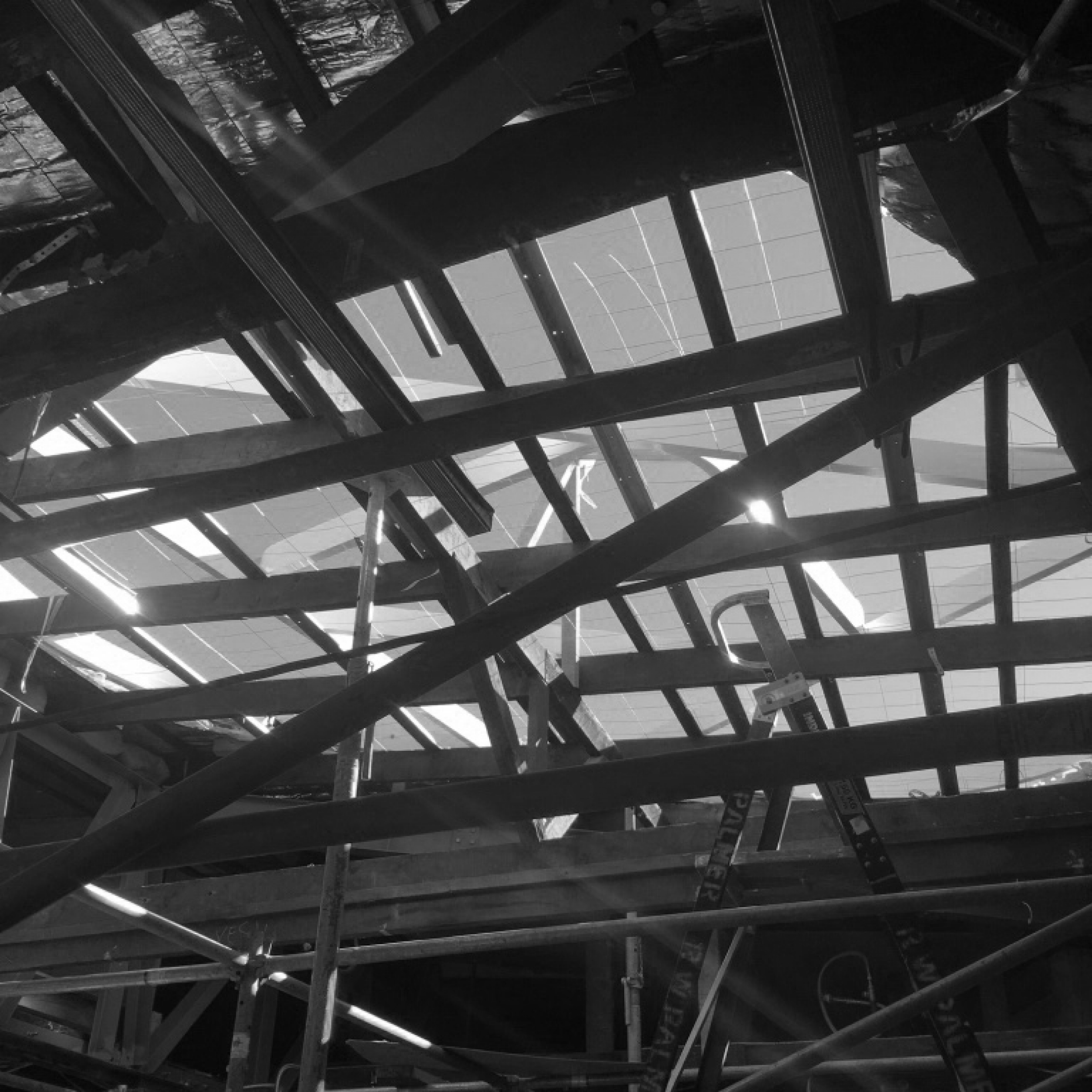 Construction framework and beams under sunlight in Jardan Sydney architectural development.