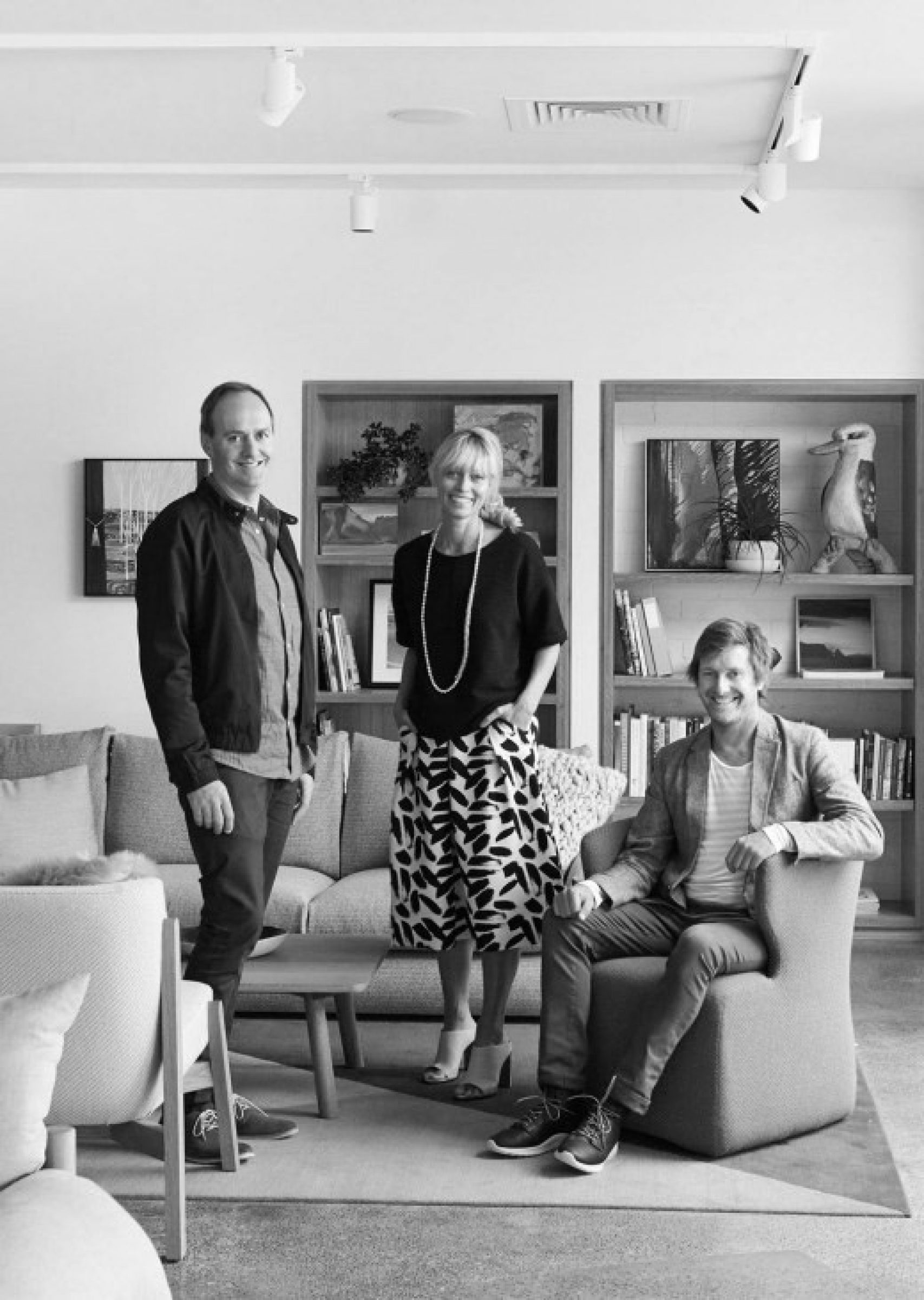 Three people in a stylish living room setting for Jardan Sydney.