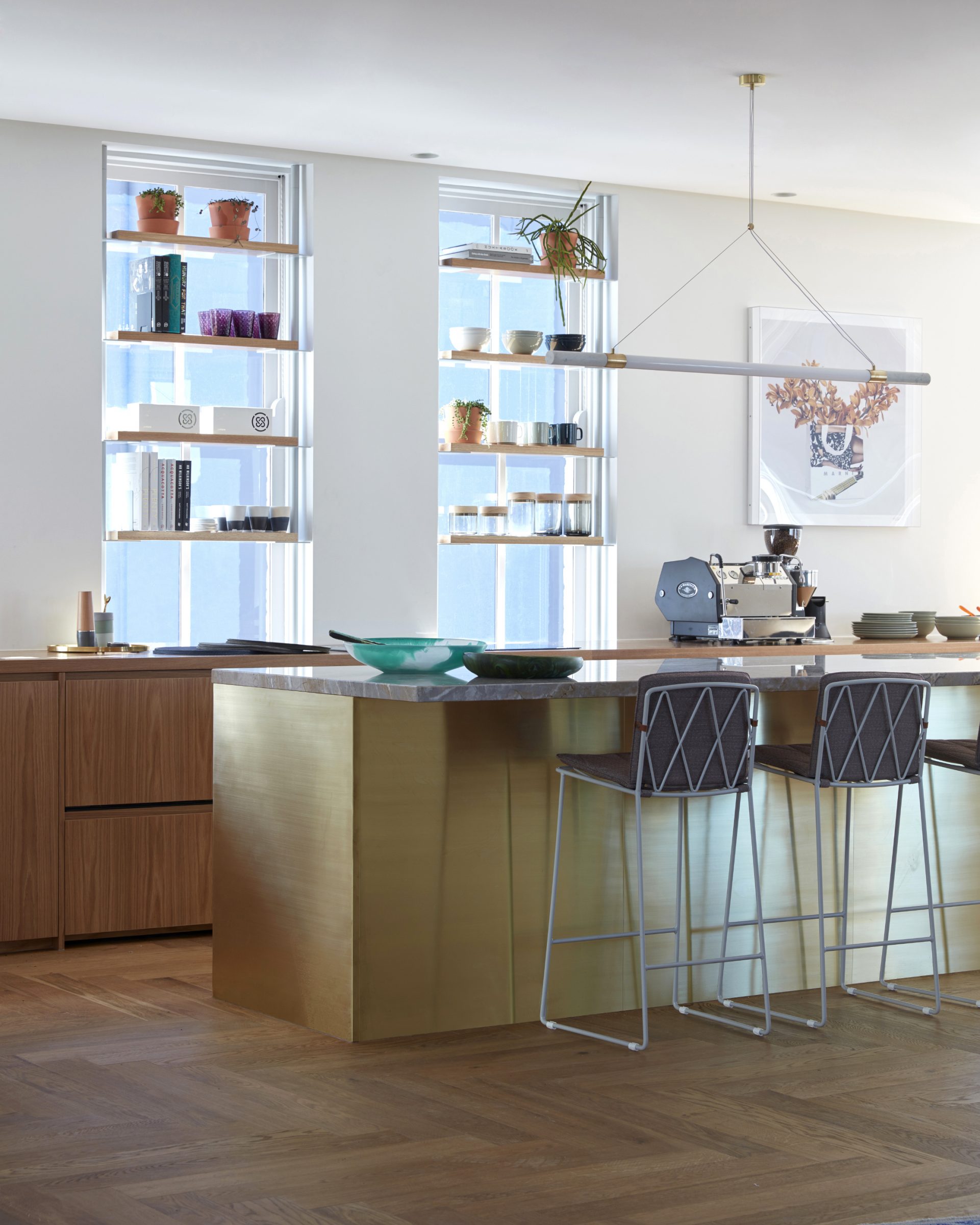 Modern kitchen interior with brass island and shelves in Jardan Sydney project.