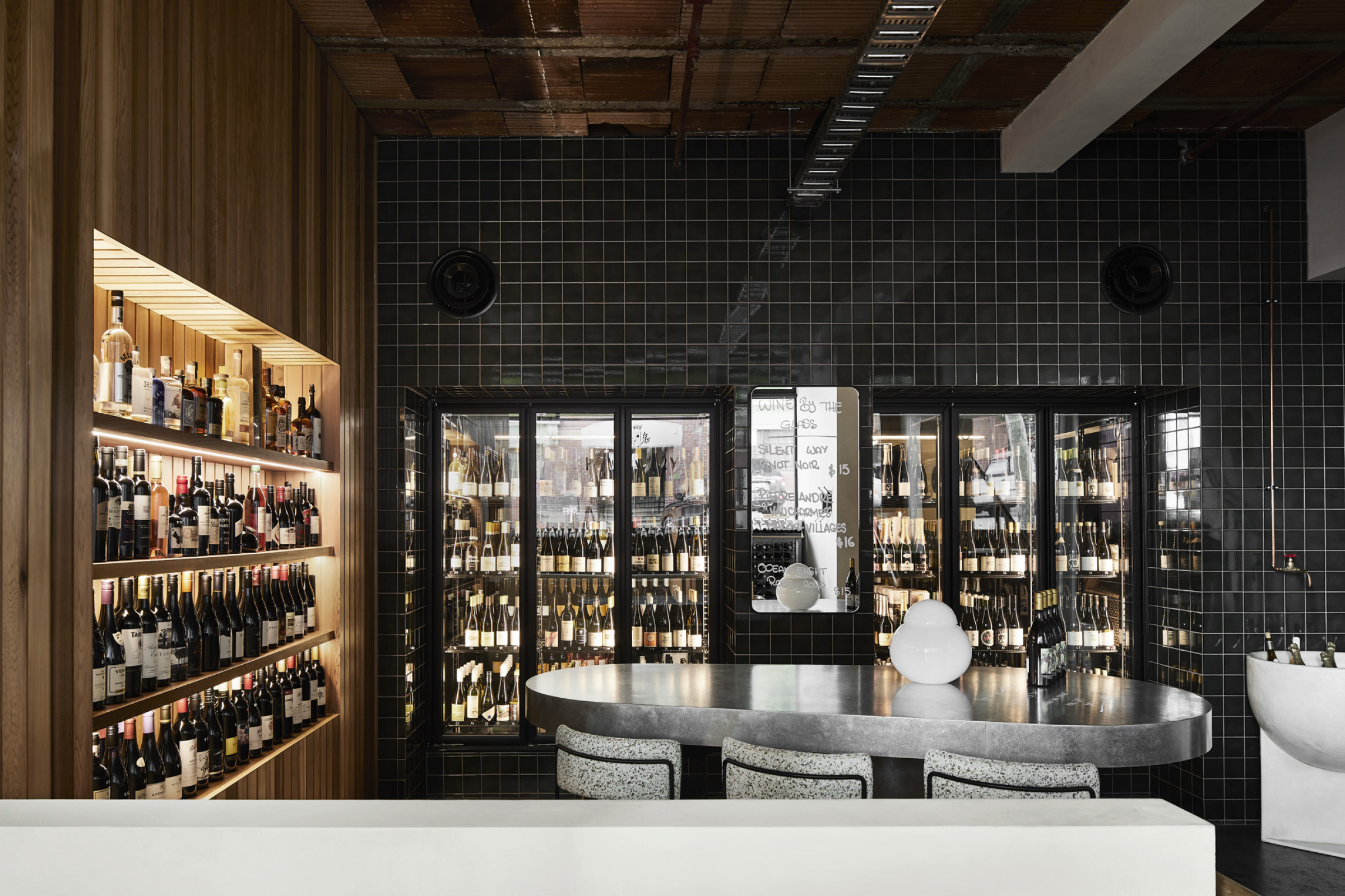 Stylish wine display and seating area at Little Prince Wine venue.