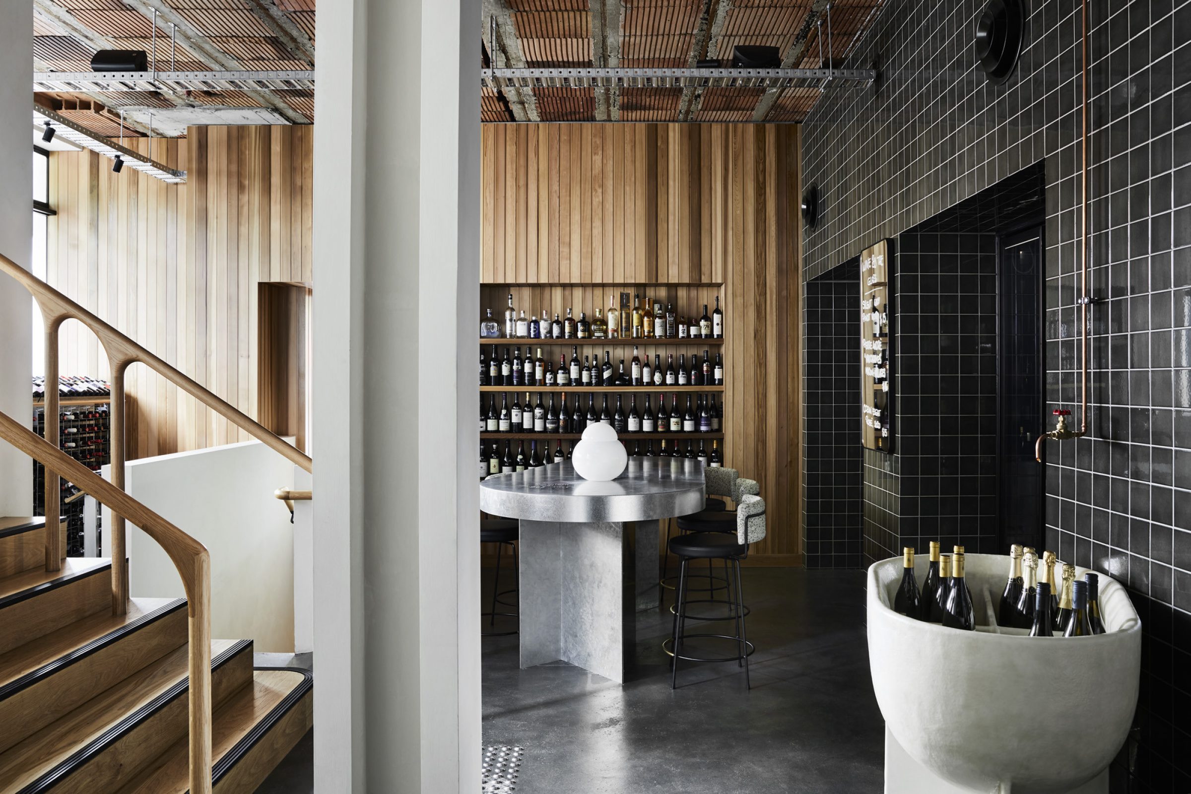 Modern wine tasting room interior with wood and tile design from Little Prince Wine.