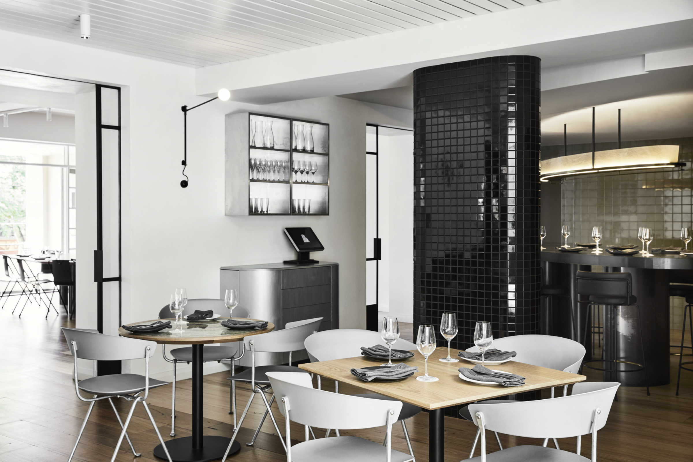 Modern dining room interior with elegant table settings from Prince Dining Room.